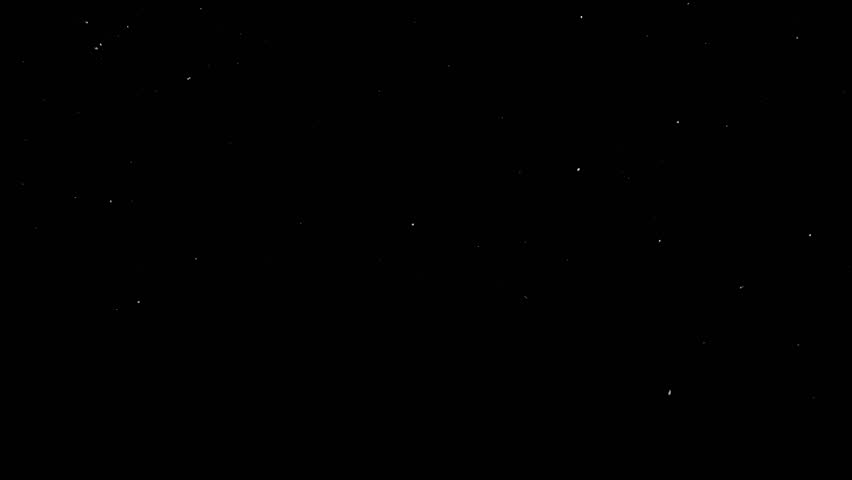 Super slow motion of natural snow falling on black background . Filmed on high speed cinema camera at 1000fps.