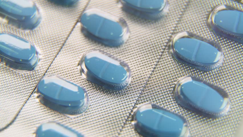 Close Up of Blue Tablet Pain Killer Drug