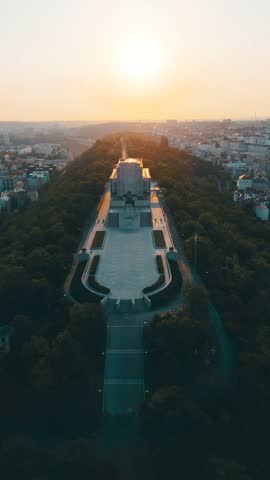 Witness the stunning sunrise over the National Monument at Vitkov. This historic site honors Jan Zizka and offers breathtaking views of Prague from its hilltop location.