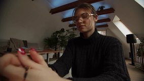 Woman earnestly praying with Bible rosary in a peaceful living space - Powered by Shutterstock - Get 15% off with code: PIKWIZARD15