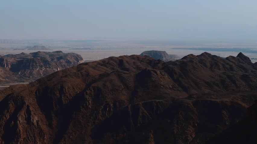 A desert landscape of desert mountains. Panorama of the colorful desert of Timna National Park in southern Israel. Travel and adventure in Israel. Desert nature.