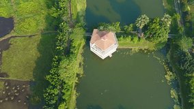 Rural Resort Bungalow Surrounded by Lush Greenery and Natural Landscape - Powered by Shutterstock - Get 15% off with code: PIKWIZARD15
