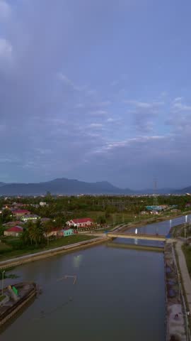 River Landscape with Distant Mountains