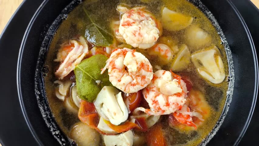 Prawn soup or Tomyam Kung in bowl, Thai famous food.