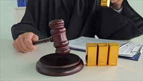 Judge overseeing trial involving gold bars and legal proceedings in courtroom setting - Powered by Shutterstock - Get 15% off with code: PIKWIZARD15