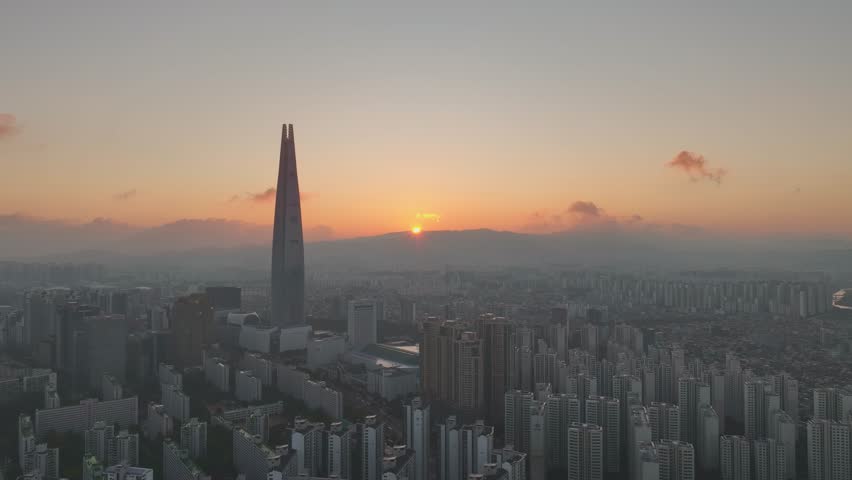 Drone View of Seoul city in South Korea, Sunrise of Jamsil, Songpa, Han River, Summer