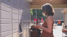 woman scans qr for collection, casual woman authenticates identity using qr code scan outdoors, young woman confidently completes quick digital verification at outdoor seating area of campus - Powered by Shutterstock - Get 15% off with code: PIKWIZARD15