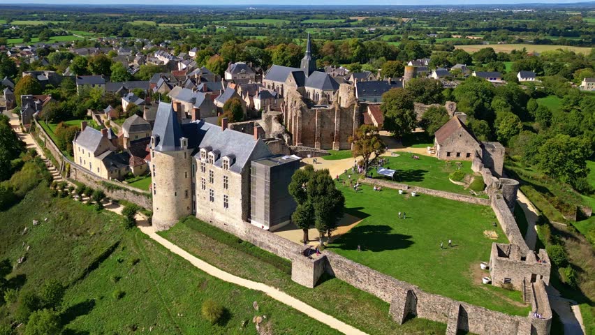 Château de Sainte-Suzanne, a medieval stronghold with its stone donjon from the 11th century and Renaissance residence overlooking the lush Erve valley, Mayenne, France,