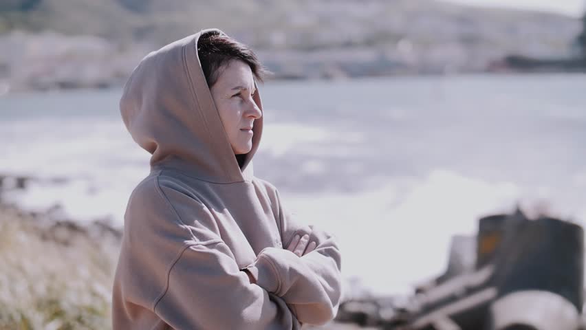 Contemplative Woman by the Sea