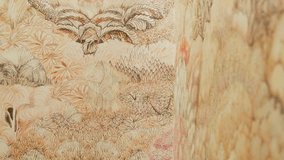 Decorative wallpaper with artistic floral pattern in warm beige tones. Elegant textured wall design for home interior or background video. Soft camera movement showing - Powered by Shutterstock - Get 15% off with code: PIKWIZARD15