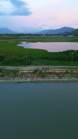 Aerial View of Lake and Mountains at Dusk