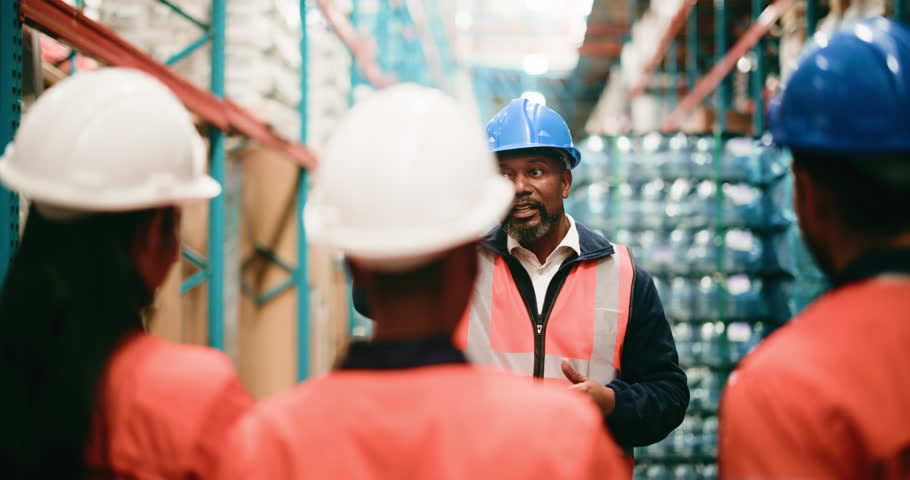 Logistics, team or manager with discussion in warehouse, package storage or distribution instructions. Supply chain, quality control or people with supervisor for safety protocol, export or inventory