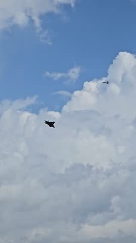 High-quality aerial video of F22 fighter jet landing at Pearl Harbor, Hawaii. Sharp military aircraft footage suitable for aviation, defense, and historical projects.