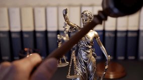 mallet gavel of  judge  knocks down the goddess Themis of justice and law  by hitting her several times ,  justice is in the ground or doesn't exist concept - Powered by Shutterstock - Get 15% off with code: PIKWIZARD15