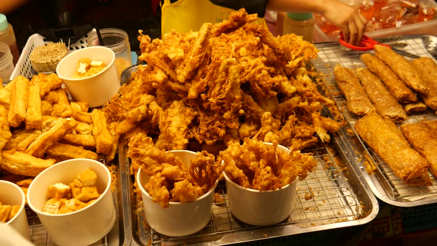 Variety of vegetarian deep-fried street food in Southeast Asia