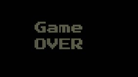 Game over message in pixelated retro style glows with neon light on a dark background representing the end of a video game session and a feeling of defeat. - Powered by Shutterstock - Get 15% off with code: PIKWIZARD15