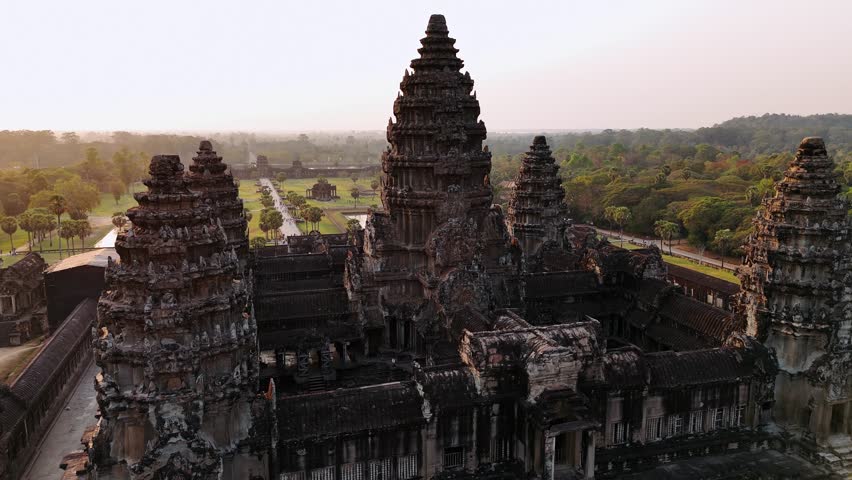 Iconic angkor wat temple complex in siem reap, cambodia, during a beautiful sunrise. UNESCO World Heritage Site.