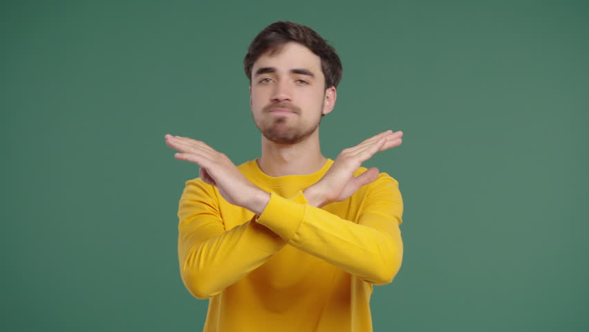 Dissatisfied Handsome Man Disapproving With No Sign, Refuse Offer. Reject, Deny