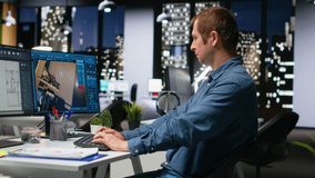 Portrait of male specialist in office uses CAD software and blueprints plan, designing house interior with user interface for virtual home customization. Detailed architectural layout. Camera B. - Powered by Shutterstock - Get 15% off with code: PIKWIZARD15