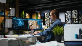 Architect engineer using AI neural networks on home modeling program to design a new apartment layout, virtual assistant helps with furniture and floor plan on architectural software. Camera A. - Powered by Shutterstock - Get 15% off with code: PIKWIZARD15