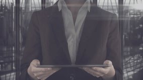 Mid-adult woman tapping tablet and revealing holo globe over tablet, panels updating for tech data. Holographic, augmented, reality, interface, projection, sphere, reflections - Powered by Shutterstock - Get 15% off with code: PIKWIZARD15