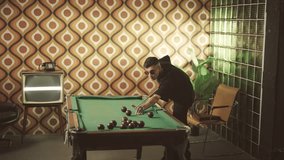 Billiards play, portrait of stylish young man in black clothes and sunglasses. Retro interior of 70s, hobby and entertainment in leisure time, contemporary and vintage fashion, modern male person - Powered by Shutterstock - Get 15% off with code: PIKWIZARD15