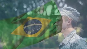 Soldier responding to call, raising and lowering military salute while Brazil flag overlay rippling. Camouflage, uniform, profile, outdoors, parade, ceremonial, patriotic - Powered by Shutterstock - Get 15% off with code: PIKWIZARD15