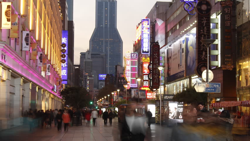 SHANGHAI - DECEMBER 19: Time lapse of Nanjing Road at night - Nanjing Road is