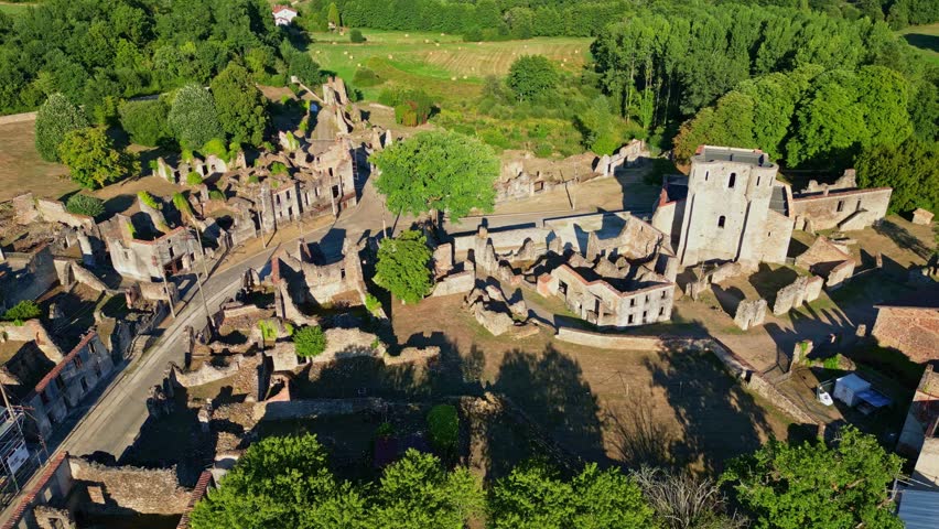 Ruins of Oradour-sur-Glane, village destroyed in World War II, France. Aerial drone sideways