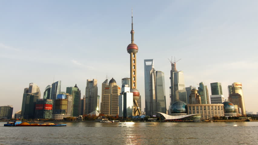 Time lapse of Shanghai skyline and busy Huangpu river - Shanghai, China.