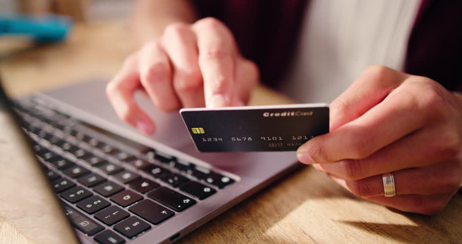 Hands, credit card and man with laptop, online shopping and internet banking with transactions. Closeup, computer and person with payment, eft purchase and fintech with ecommerce and discount deal