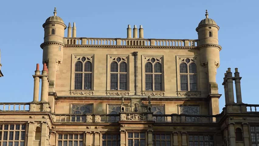 View of Wollaton Hall located in Wollaton Park, Nottingham, England. This magnificent mansion is one of Nottingham’s most famous historic landmarks, surrounded by lush parkland, gardens, and deer.