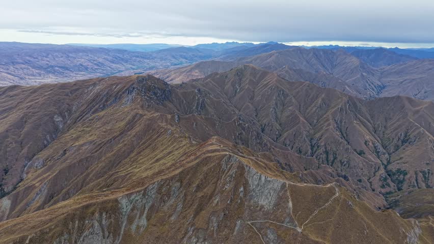 Aerial view of Roys Peak, New Zealand; hikers enjoy scenic thrills