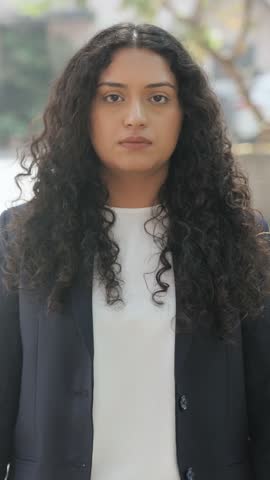Vertical Video of Curly Hair Indian Businesswoman Feeling Guilty