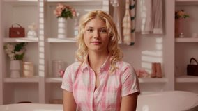 Caucasian girl female teenager woman in pink candy glamour bathroom holding striped candy red lollipop in heart shape biting eating yummy sugar snack lollypop looking at camera indoors bite eat happy - Powered by Shutterstock - Get 15% off with code: PIKWIZARD15