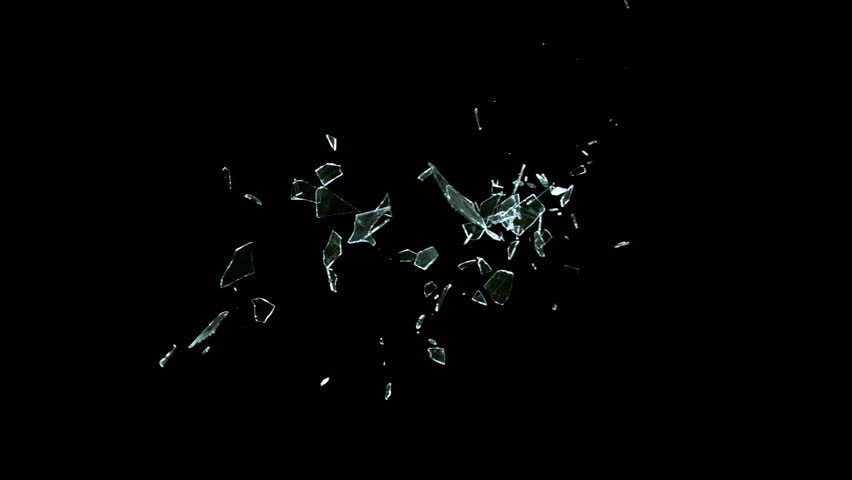 Super Slow Motion Shot of Breaking Real Glass at 1000 fps . Isolated on Black Background