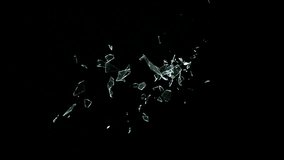 Super Slow Motion Shot of Breaking Real Glass at 1000 fps . Isolated on Black Background - Powered by Shutterstock - Get 15% off with code: PIKWIZARD15