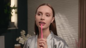 Woman brushing teeth dancing singing toothbrush microphone funny active morning routine healthy beauty dental oral care home bathroom hygiene Caucasian female girl having fun sing dance in hotel home - Powered by Shutterstock - Get 15% off with code: PIKWIZARD15