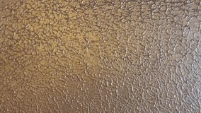 Golden Textured Surface with Irregular Relief. texture of stone wall. Abstract Golden Textured Surface with Organic Relief. - Powered by Shutterstock - Get 15% off with code: PIKWIZARD15