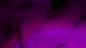 Paint vapor. Pigment flow. Purple pink ink haze stream rolling on black sparkling surface. Light lens neon color mix blur abstract background. - Powered by Shutterstock - Get 15% off with code: PIKWIZARD15