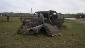 vintage vehicle with damaged parts, decayed sedan capturing interior and exterior features, archivist taking detailed photographs of abandoned car with broken panels and open doors - Powered by Shutterstock - Get 15% off with code: PIKWIZARD15