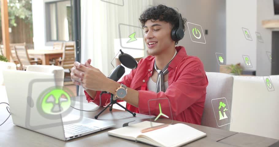 Male podcaster putting on headphones, adjusting mic, explaining green energy with icons around him. Creator, presenter, laptop, content, marketing, modern, media
