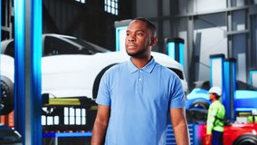 African Mechanic Stressed While Repairing Broken Car In Detailing Garage - Powered by Shutterstock - Get 15% off with code: PIKWIZARD15