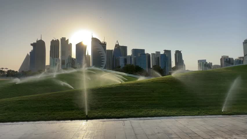 Sunset over Doha skyline with modern skyscrapers in Qatar