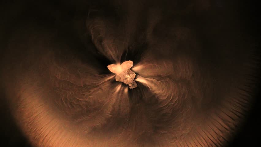  abstraction. motion of pieces of dry ice falling into water, interpretation of cometary motion