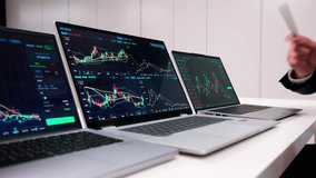 Businesspeople Analyzing Stock Market Data On Computer Monitors - Powered by Shutterstock - Get 15% off with code: PIKWIZARD15