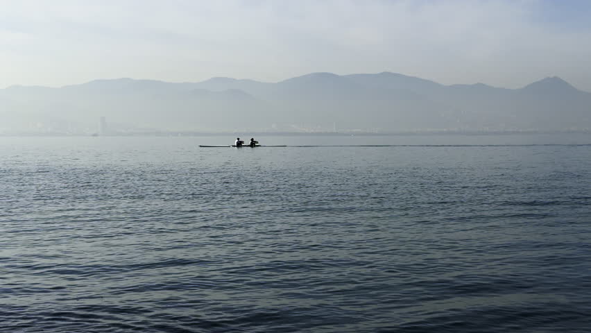 Making Canoe Sport in Calm Sea View
