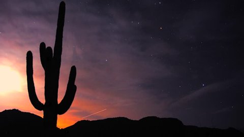A time-lapse of the stars above the Harquahala Mountains in Arizona, USA. Sunset immediately followed by star lapse movement in space. Beautiful and artistic. Moon.