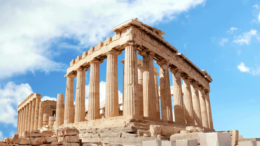 Architectural masterpiece, the Parthenon, a unique UNESCO world heritage archaeological site of Acropolis hill with  clouds and deep blue sky, Athens historic center, Attica, Greece