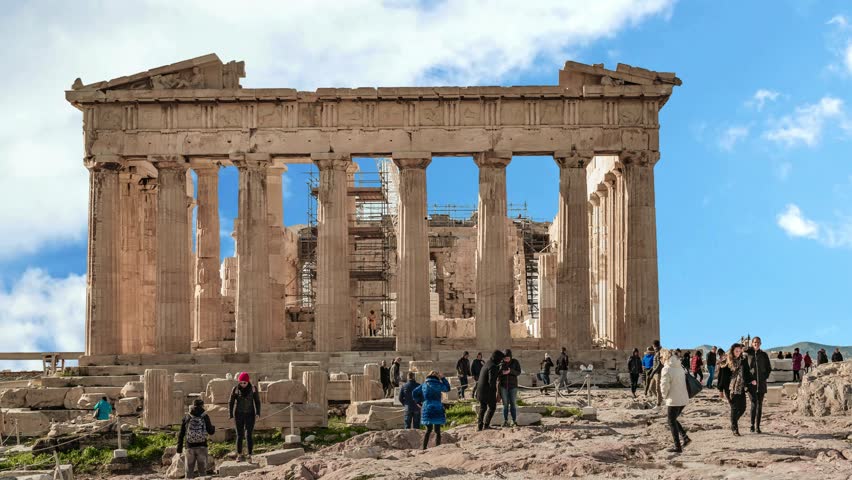 Architectural masterpiece, the Parthenon, a unique UNESCO world heritage archaeological site of Acropolis hill with  clouds and deep blue sky, Athens historic center, Attica, Greece